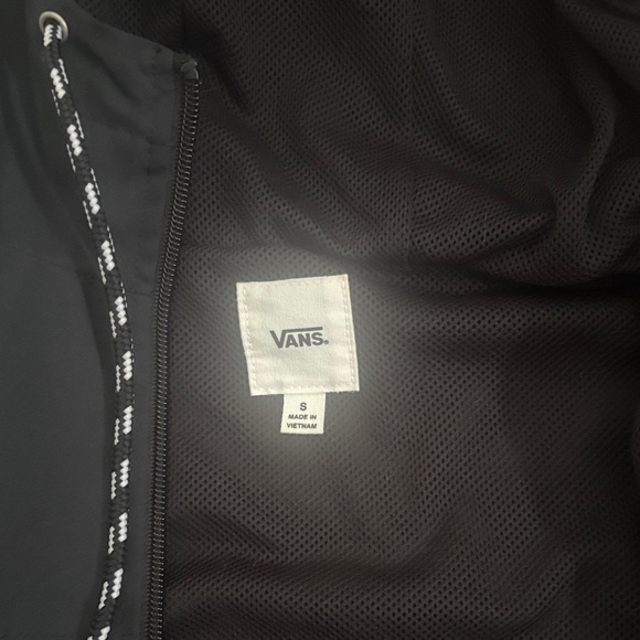 Men’s Vans Black Hooded Raincoat with Checkered Accents

Brand new!! - Picture 5 of 5